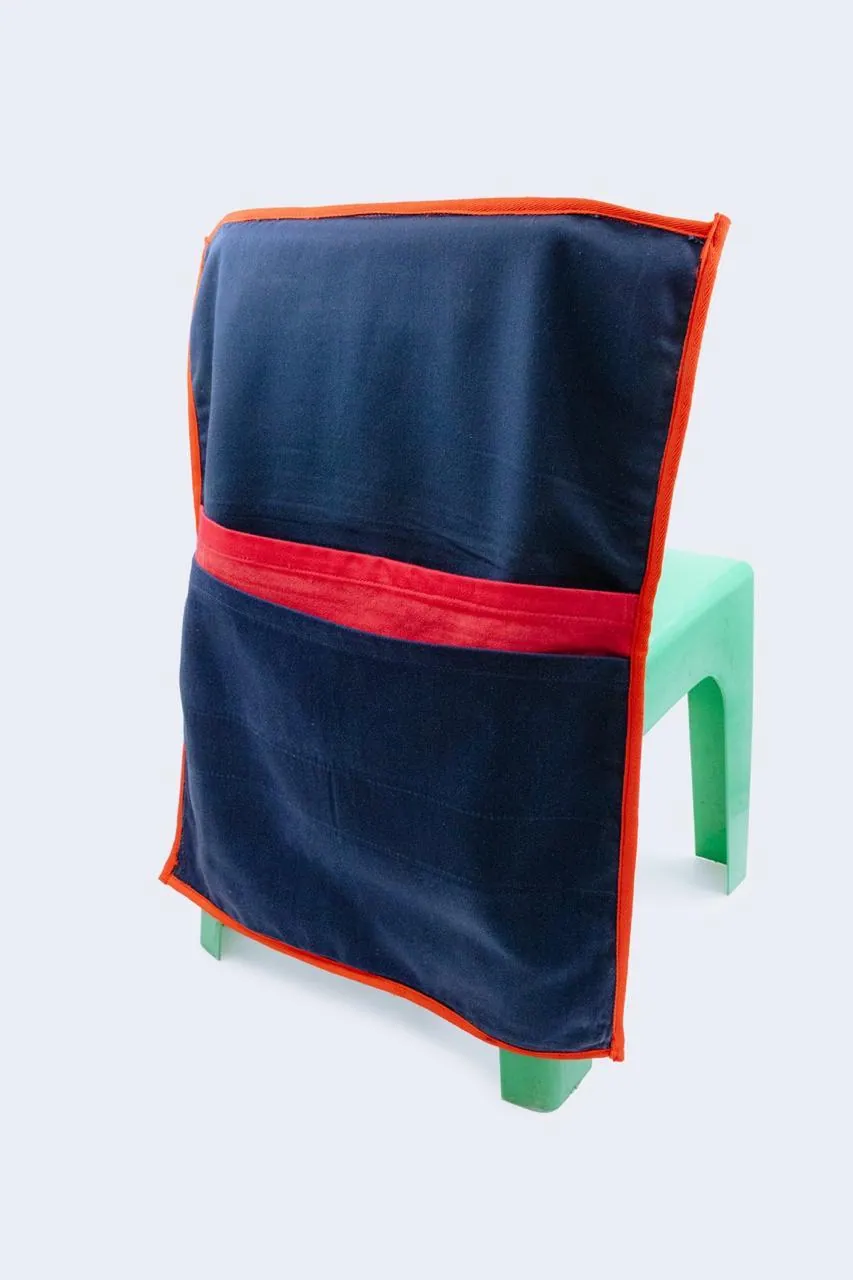 Upcycled chair cover in navy with red trim