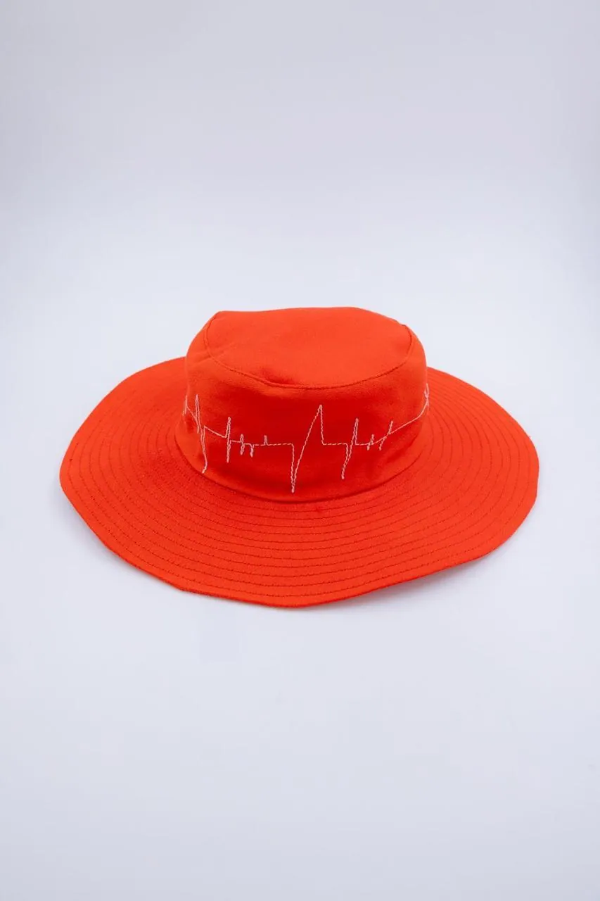Orange bucket hat with heartbeat embroidery